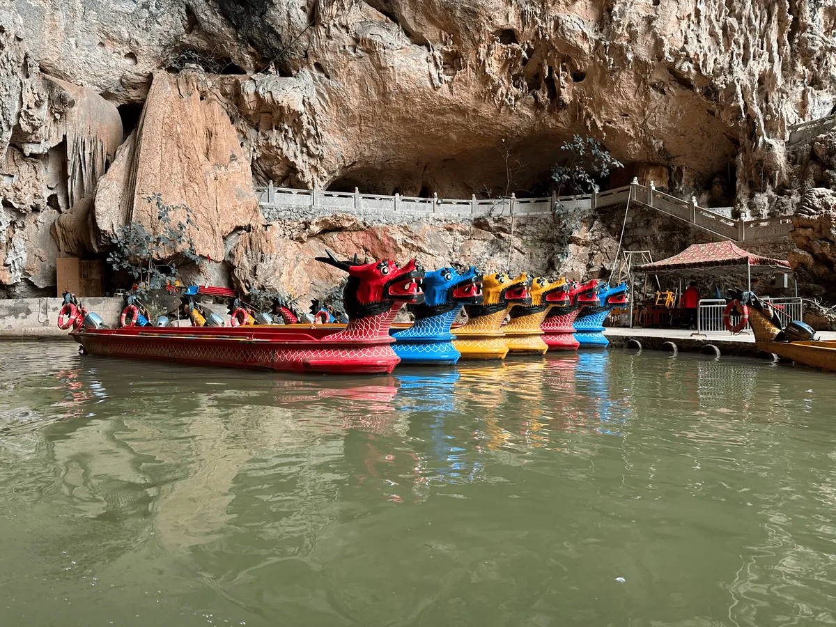 Multiple dragon boats docked at the station