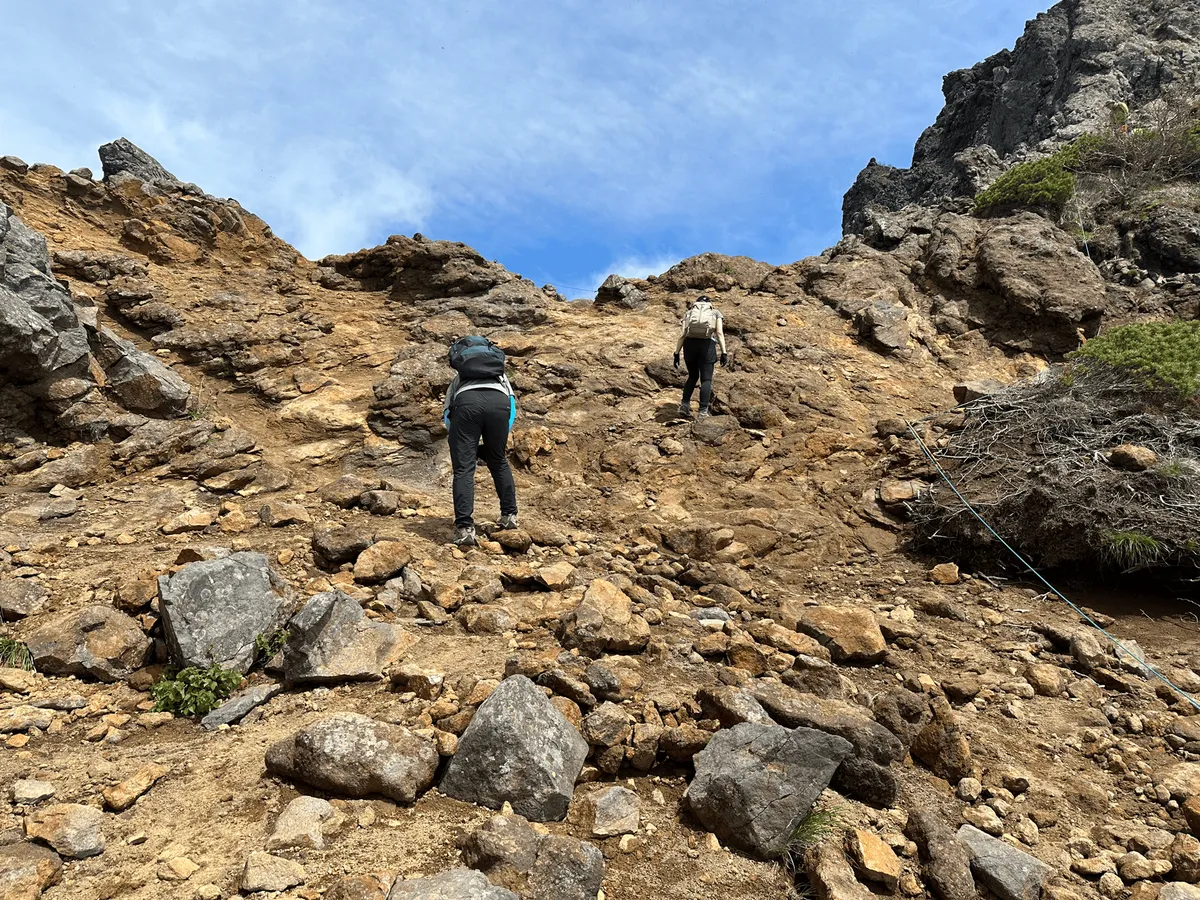 A steep climb over yellow-ish rock