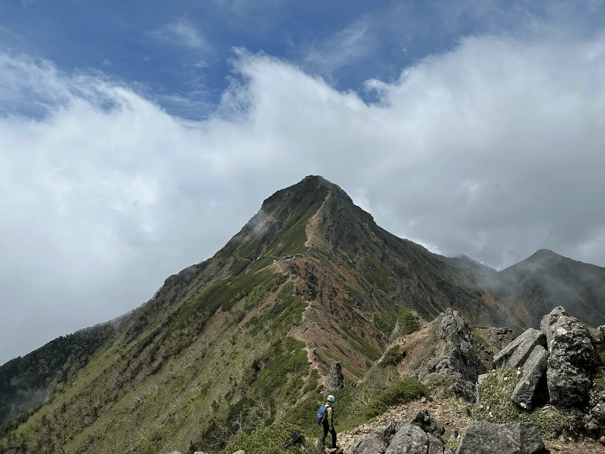 Mt Aka from a distance. You can see the mountain hut in the foreground.