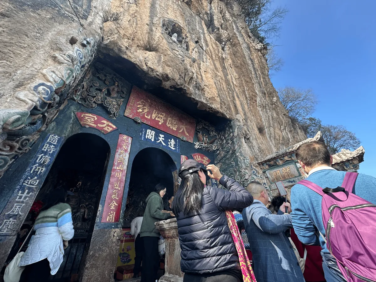 Detailed view of the Dragon Gate's carved architecture