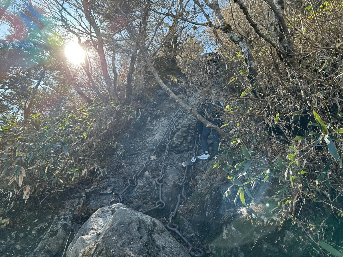 A portion of chain climbing, less steep.