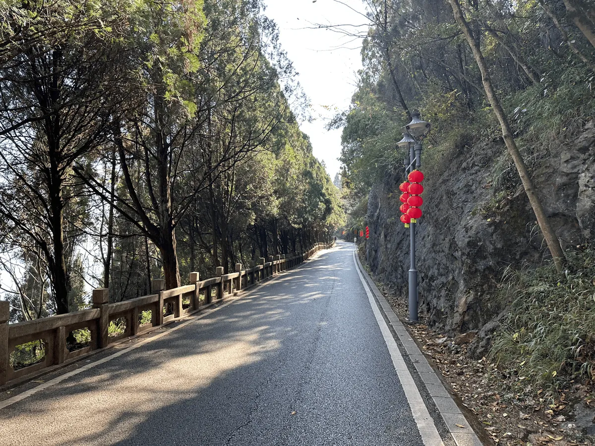 A paved road winding up the mountain