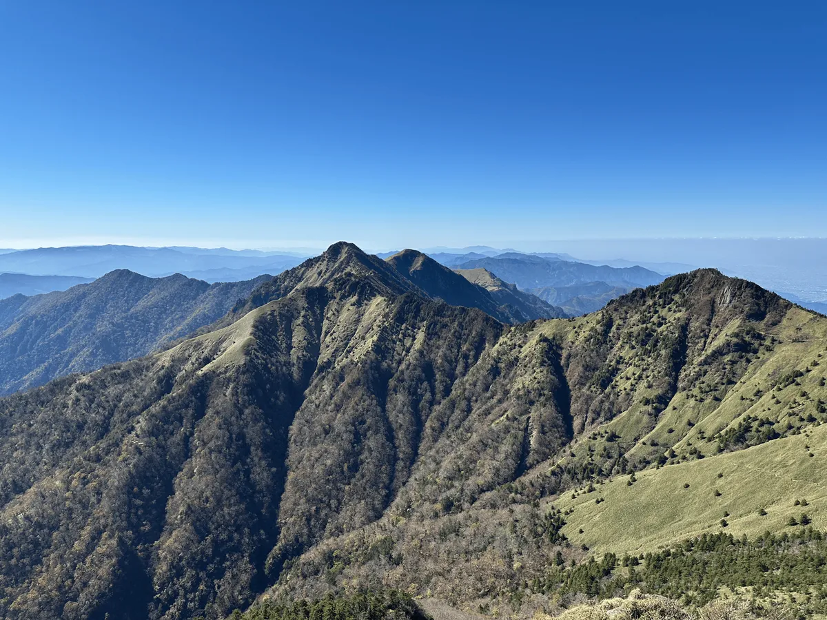 A very green-looking mountain peak