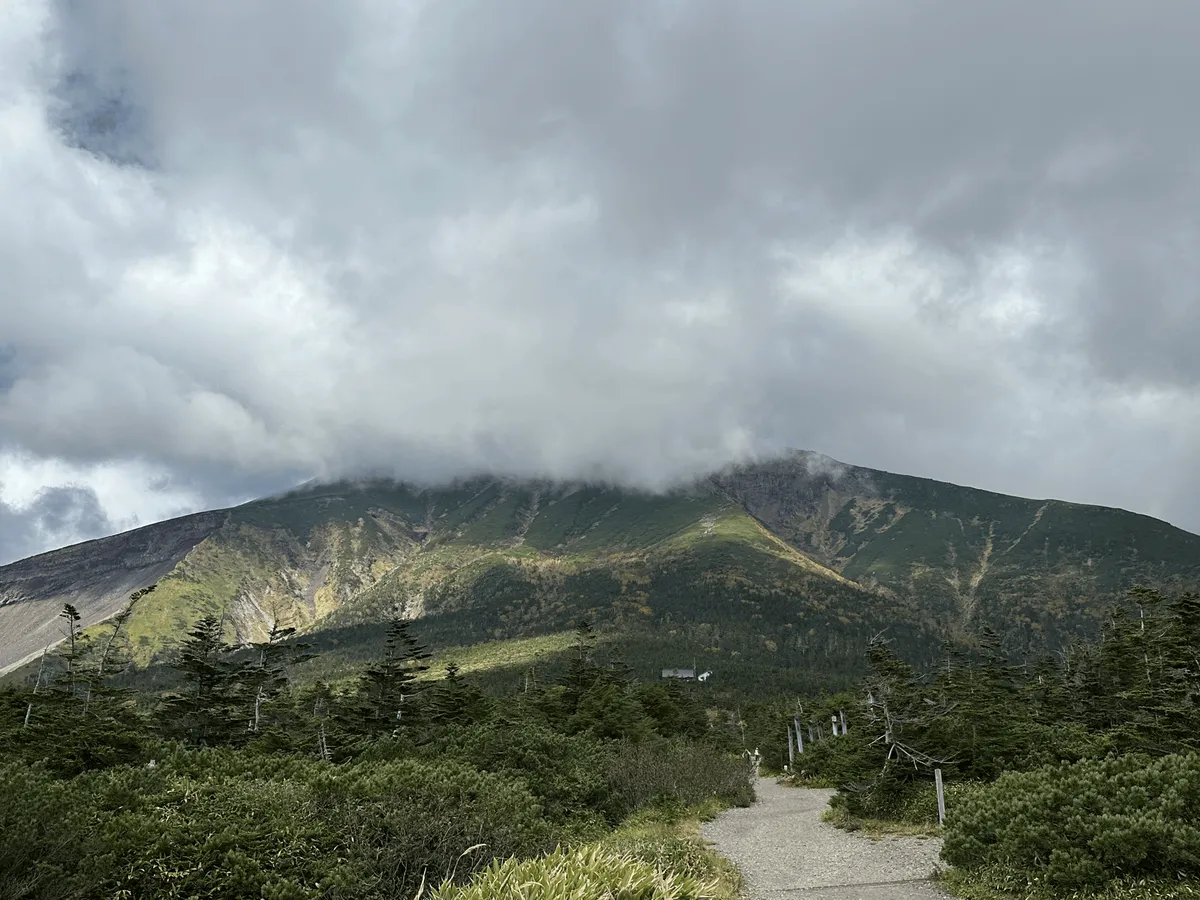 The peak of Mt Ontake obscured by clouds.