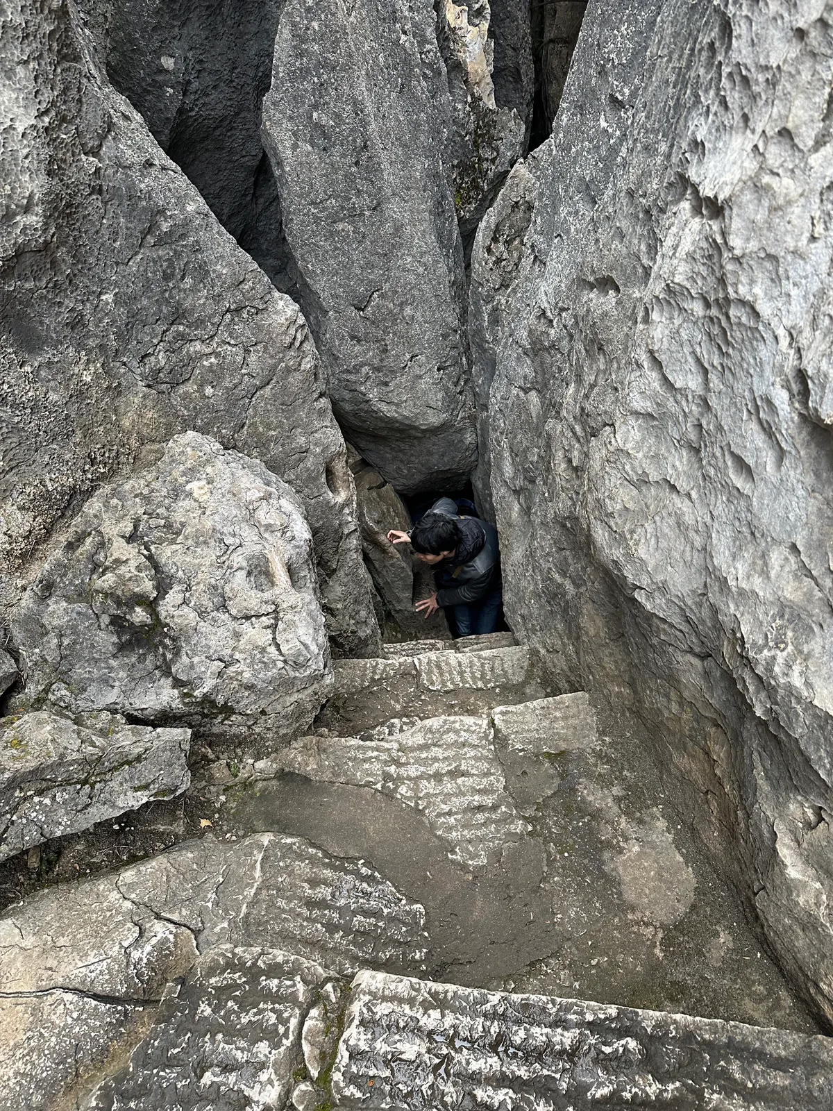 A very narrow passage between two tall limestone formations