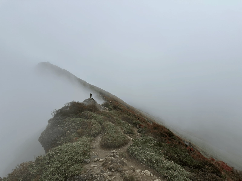 Another photo towards Toma-no-mi, with a person standing on a rock