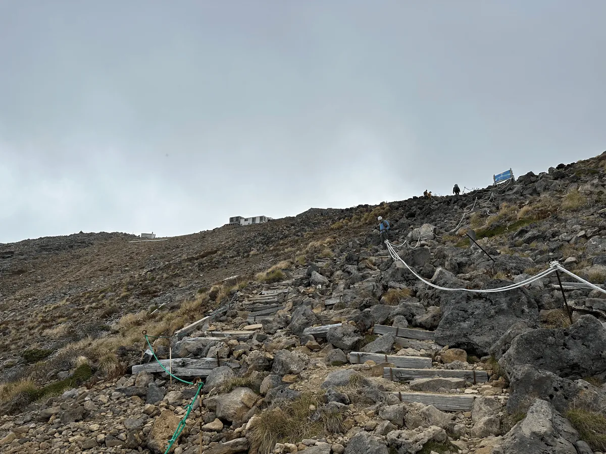 Final stretch of rocks, a building is visible in the distance