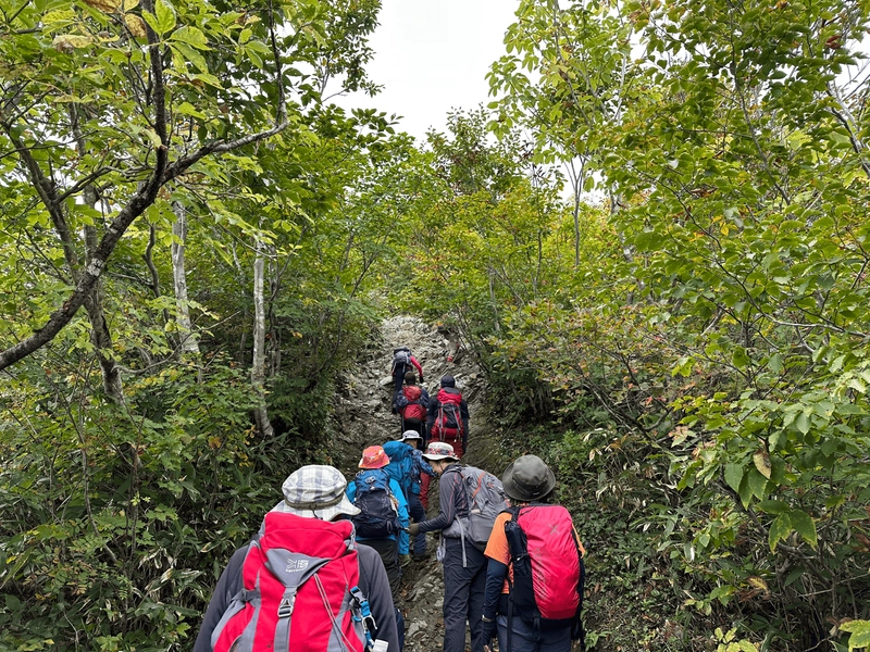 A steep rock climb, with about 8 people in front of me.