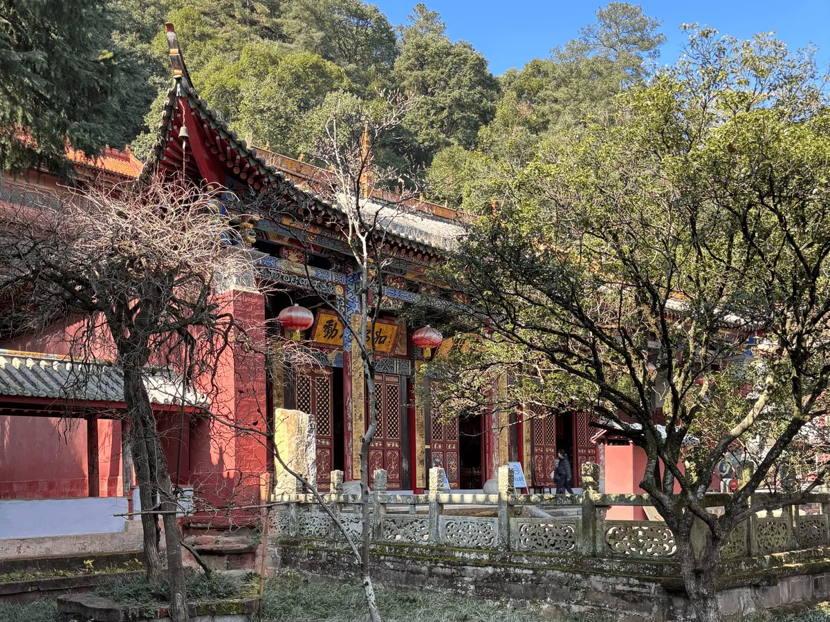 Interior view of Taihua Temple showing Buddhist statues and decorations