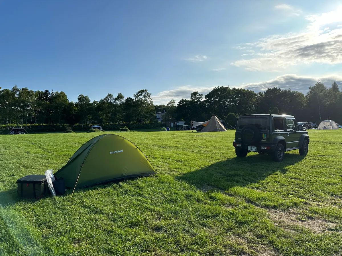 My Jimny parked next to my tent.