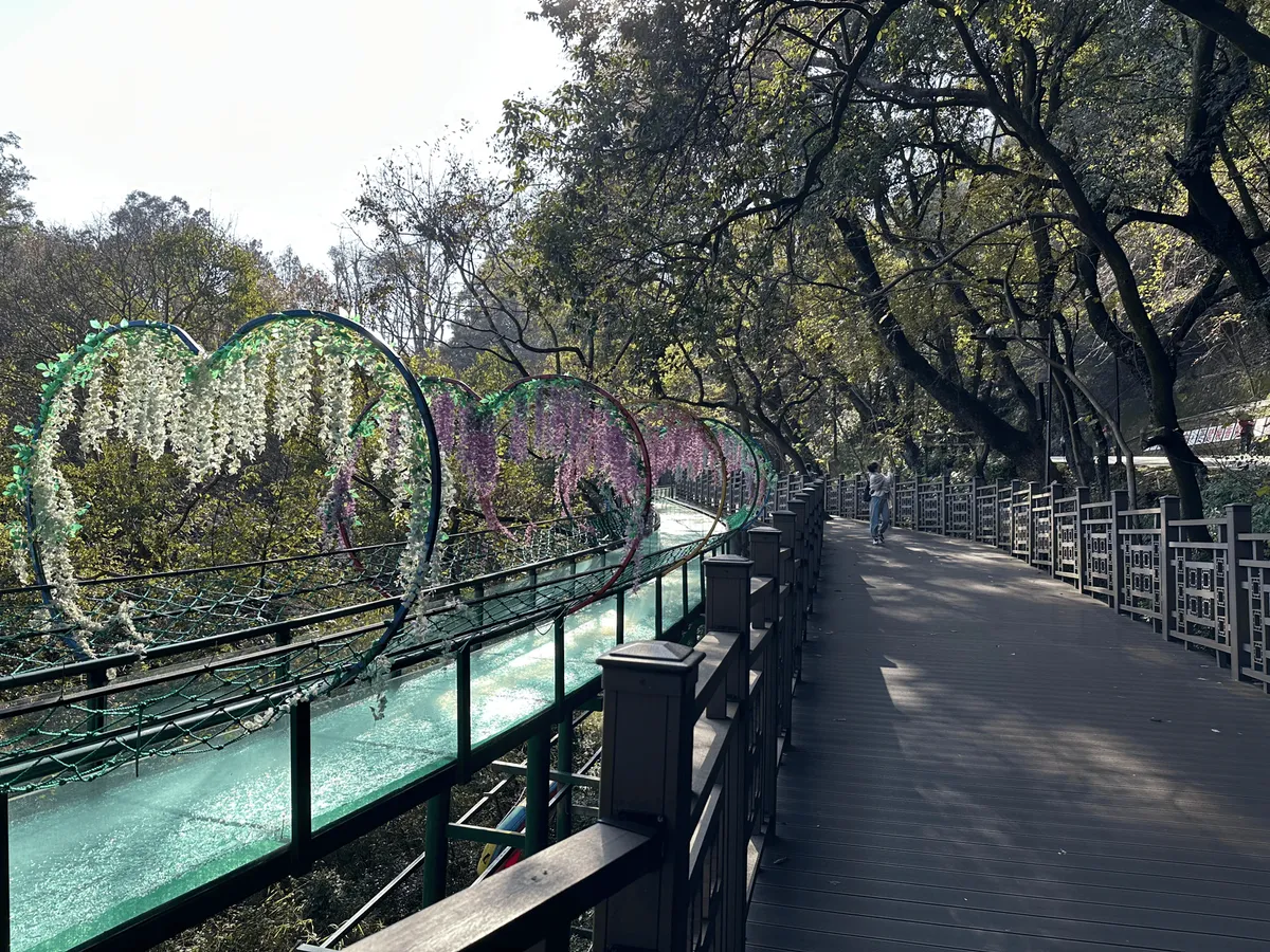 A waterslide running parallel to the walking path